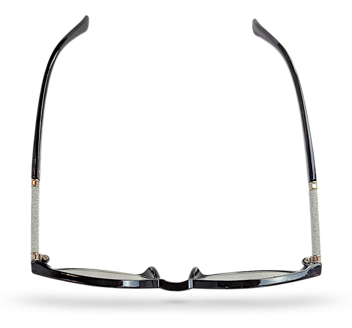 Eyelevel-UK Lima black reading glasses with round frames and glitter detail on the arms, seen from above.