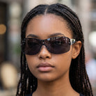 Eyelevel-UK Lois wrap-style black sunglasses with diamante detail on the lens and gradient grey lenses.