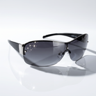 Eyelevel-UK Lois ladies wraparound sunglasses in black and silver with grey gradient lenses and decorative stone detail.