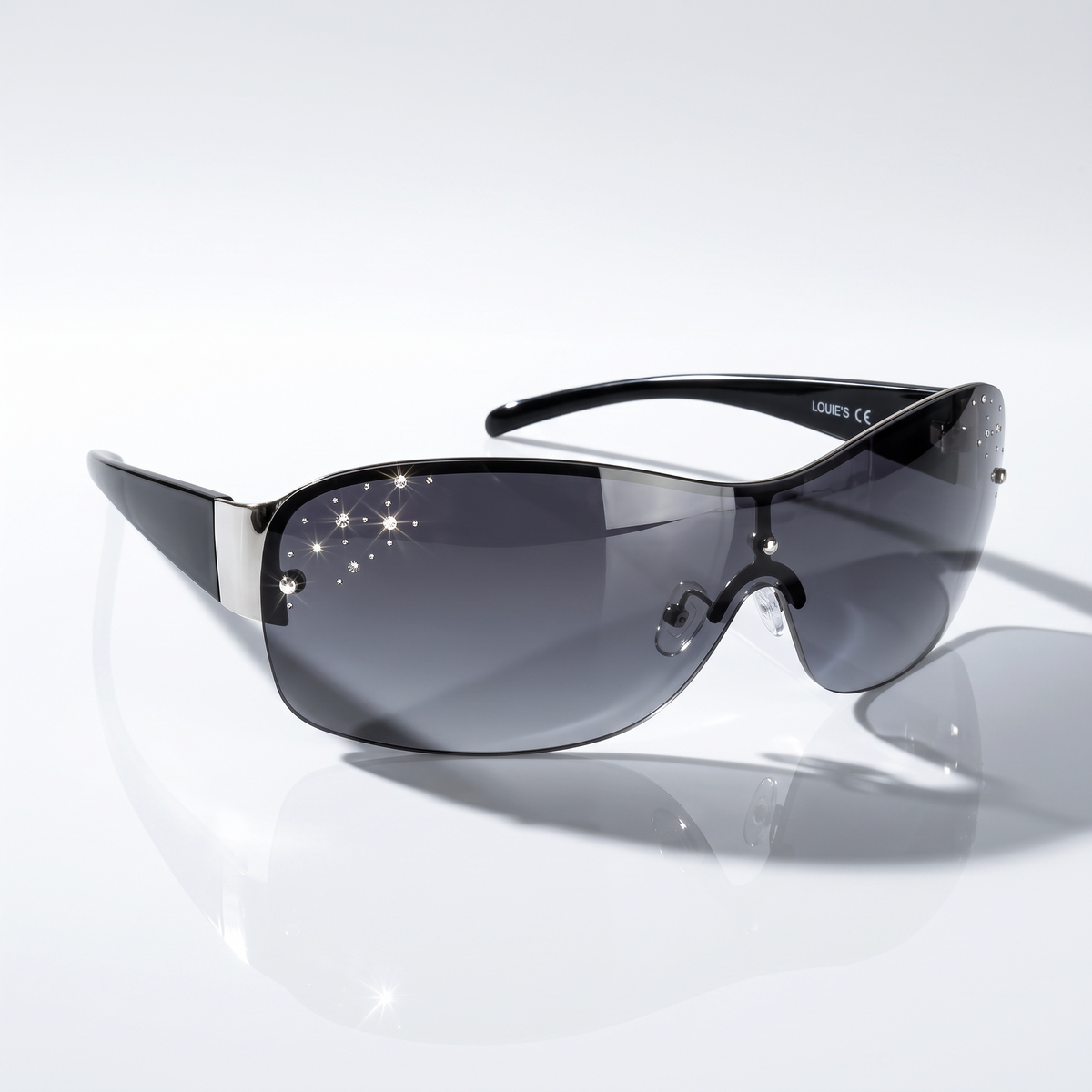 Eyelevel-UK Lois ladies wraparound sunglasses in black and silver with grey gradient lenses and decorative stone detail.