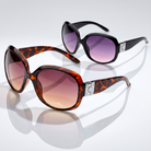 Eyelevel-UK Lucy oversized geometric sunglasses in brown tortoiseshell and black with gradient lenses on white surface