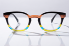 Eyelevel-UK Majestic reading glasses with rounded-square black, orange, and yellow translucent plastic frames.