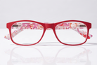 Eyelevel-UK Malibu reading glasses with a red and pink multicolour patterned frame and clear magnifying lenses.