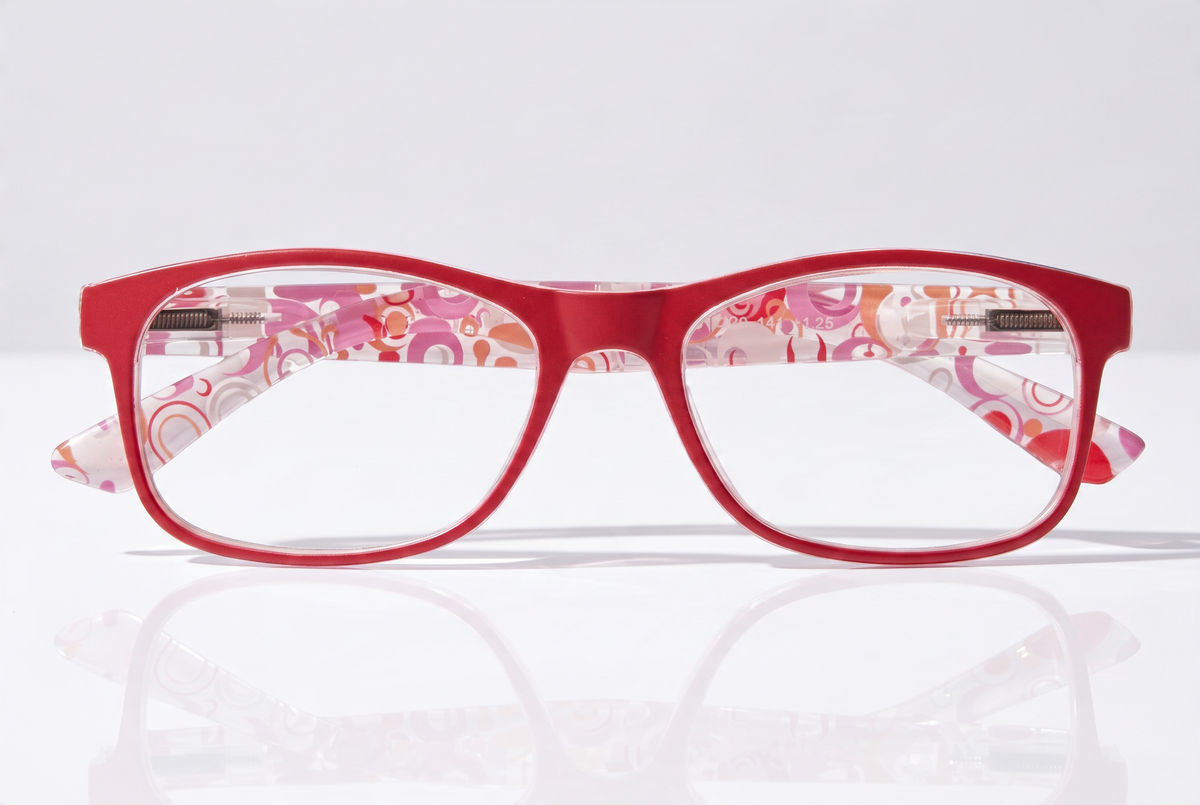 Eyelevel-UK Malibu reading glasses with a red and pink multicolour patterned frame and clear magnifying lenses.