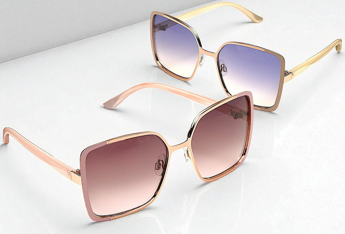 Eyelevel-UK Mya oversized geometric sunglasses in rose gold with pink and grey gradient lenses on a white surface