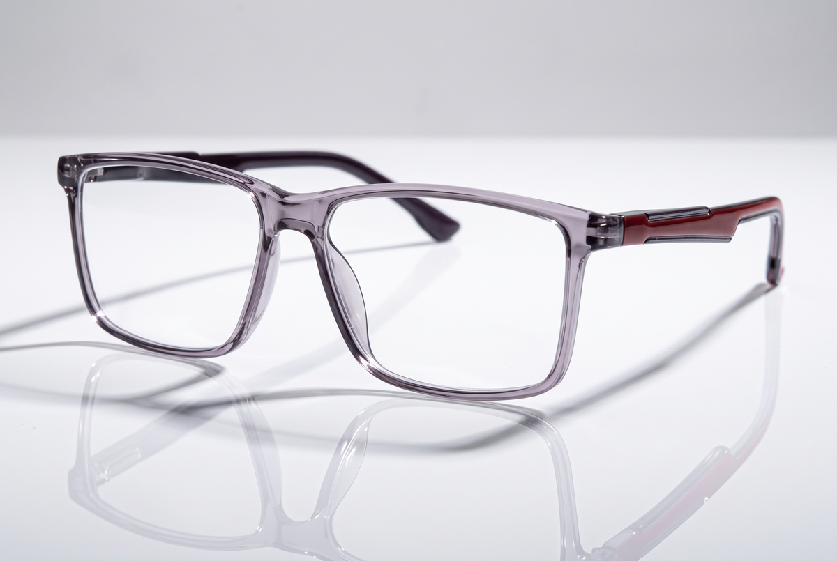 Eyelevel-UK Newton reading glasses with a grey transparent square frame and clear magnifying lenses.