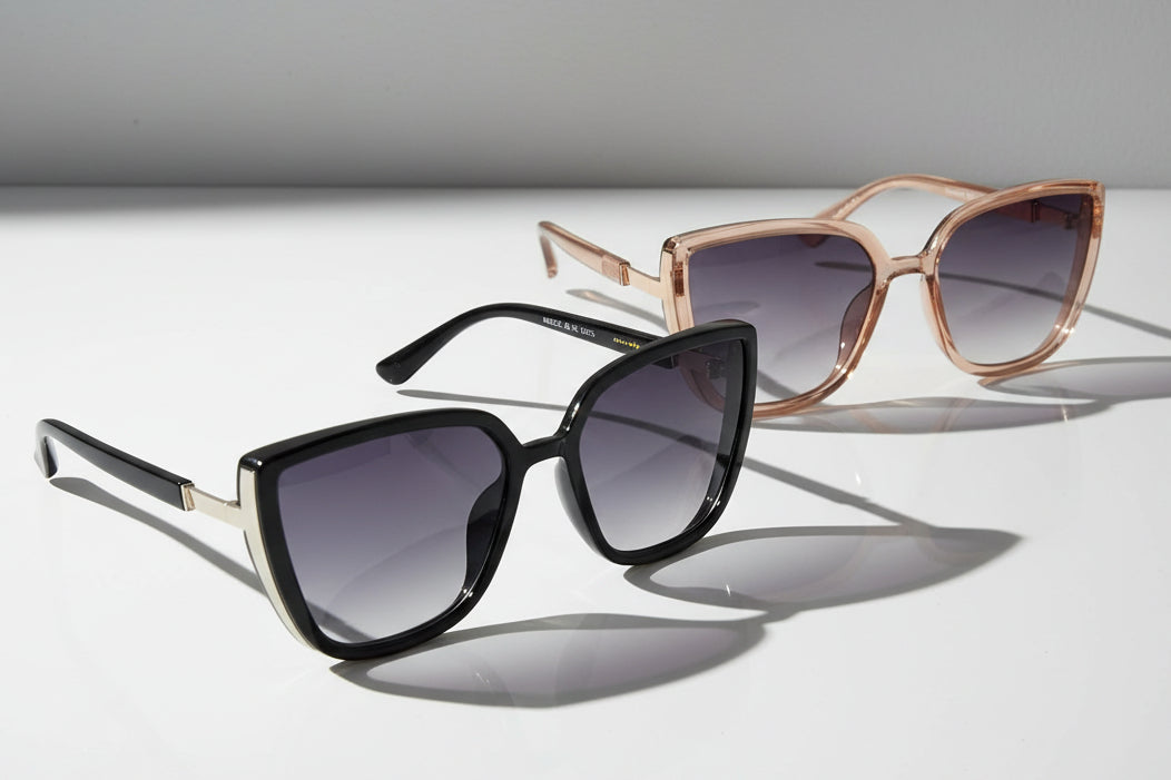 Eyelevel-UK Nicole oversized ladies fashion sunglasses in black and brown crystal frames with grey gradient lenses.