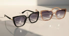 Eyelevel-UK Nicole oversized ladies fashion sunglasses in black and brown crystal frames with grey gradient lenses.