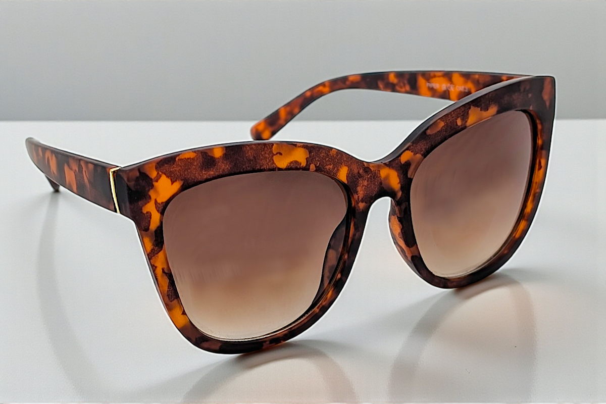 Eyelevel-UK Piper oversized cat-eye sunglasses in brown tortoiseshell with soft touch finish and brown gradient lenses.