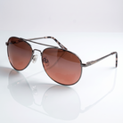 Eyelevel-UK Roadster driving sunglasses with gunmetal frames, tortoiseshell arms, and high-density brown lenses.