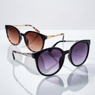 Eyelevel-UK Robyn oversized round sunglasses in brown tortoiseshell and black with gradient lenses on a reflective base