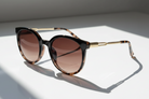Eyelevel-UK Robyn oversized round sunglasses in brown tortoiseshell and gold with brown gradient lenses