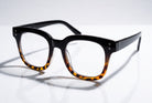 Eyelevel-UK Santorini reading glasses with a black and brown tortoiseshell square plastic frame on a white surface.