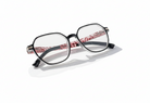 Eyelevel-UK St Kitts reading glasses with a translucent grey squared frame and patterned black and red temples.