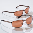 Eyelevel-UK Stirling polarized driving sunglasses with copper lenses and gunmetal frames on a reflective surface